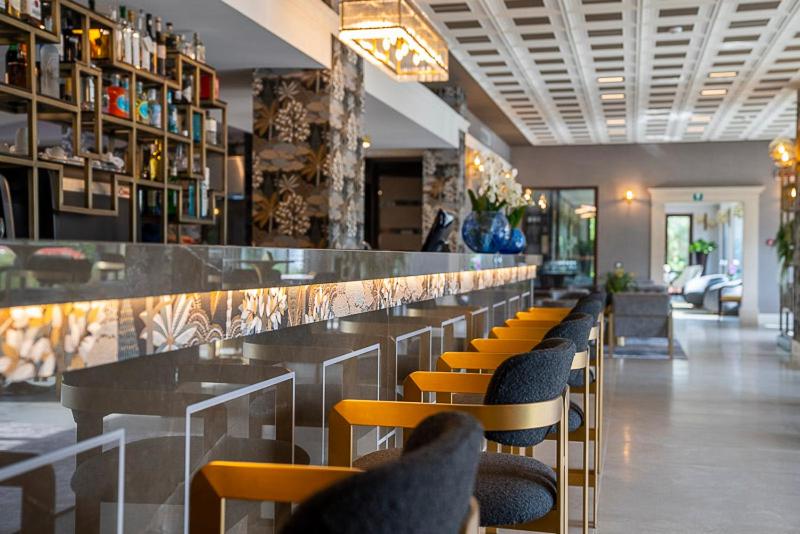 Lounge alebo bar v ubytovaní Palazzo della Scala Spa Hotel Suites & Apartments