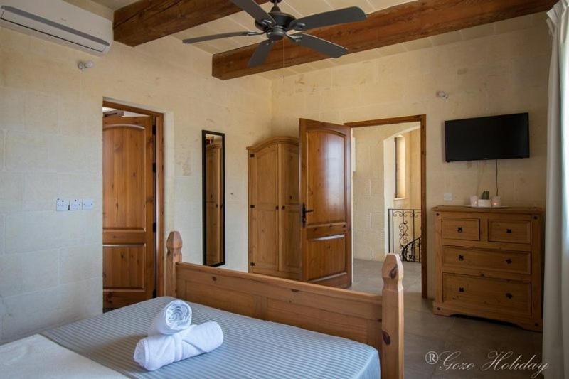 Postel nebo postele na pokoji v ubytování Villa Mandolina