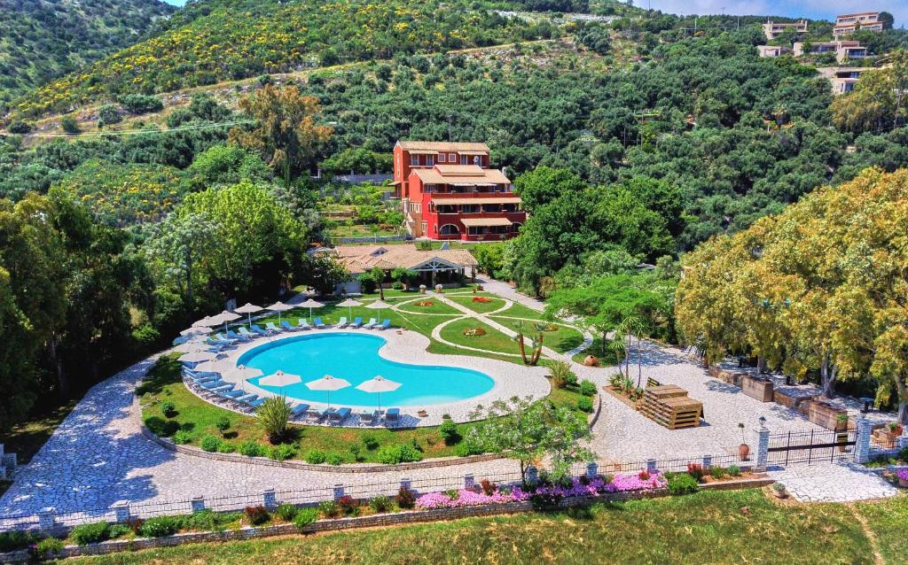 Bazén v ubytování Chrismos Luxury Suites Apraos Corfu nebo v jeho okolí