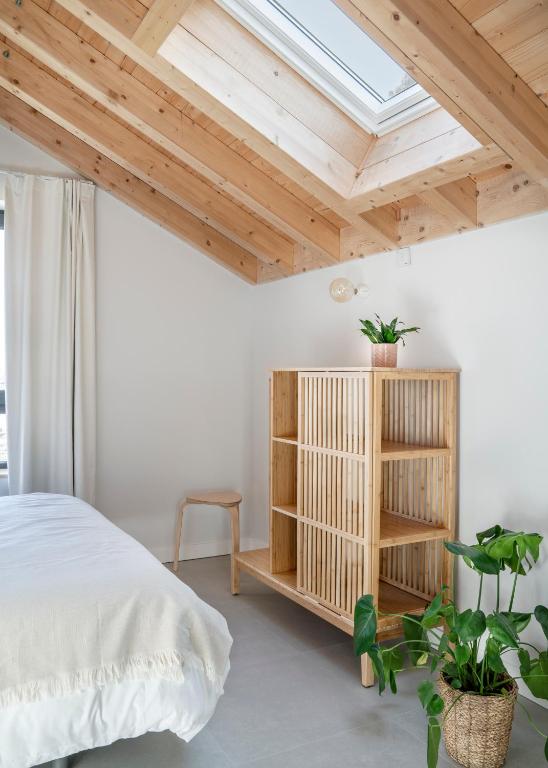 Posteľ alebo postele v izbe v ubytovaní BAO5 APARTAMENTO