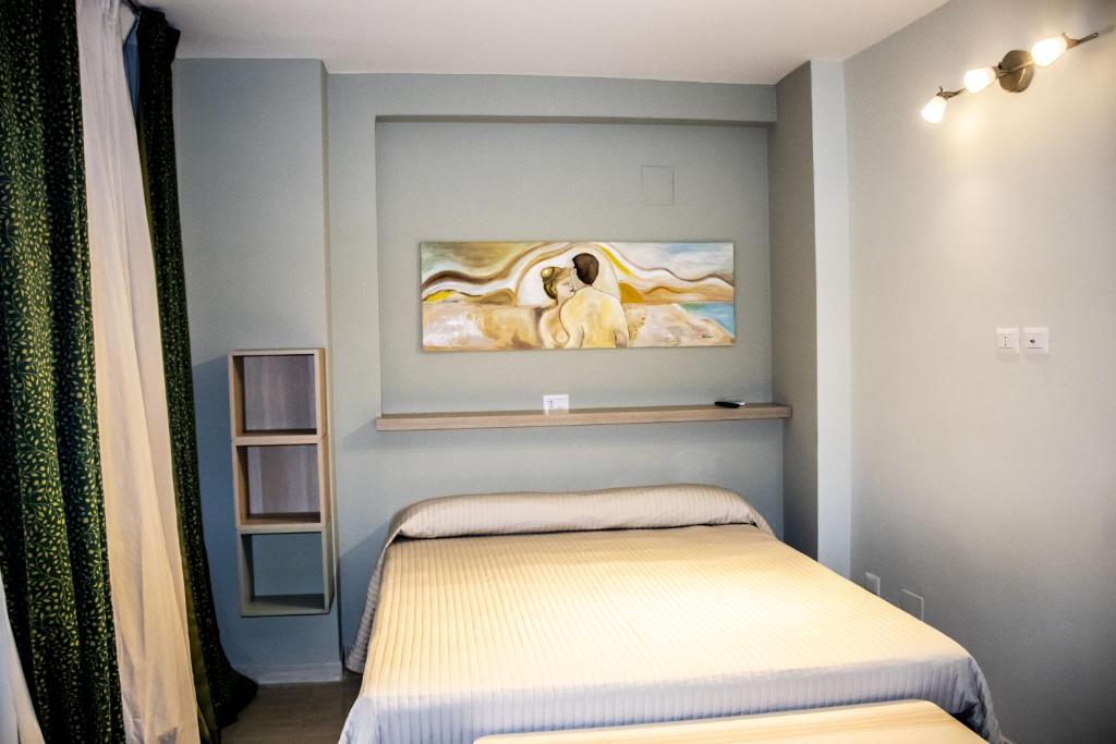 Postel nebo postele na pokoji v ubytování Il Giunco B&B