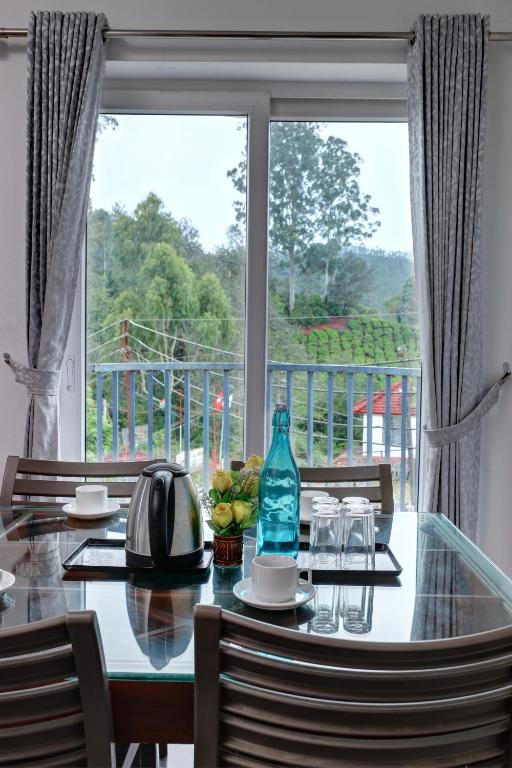Balkón nebo terasa v ubytování Kurinji Wanderlust Resort Munnar