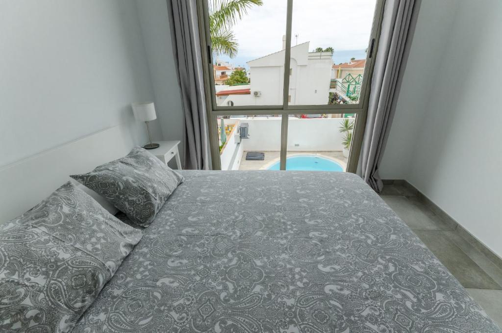 Postel nebo postele na pokoji v ubytování Vv Sunny Holiday Villa Maspalomas