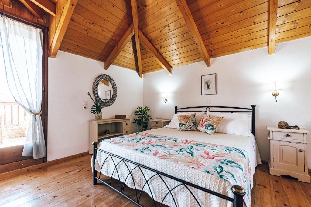 Postel nebo postele na pokoji v ubytování Casa Koukounaria