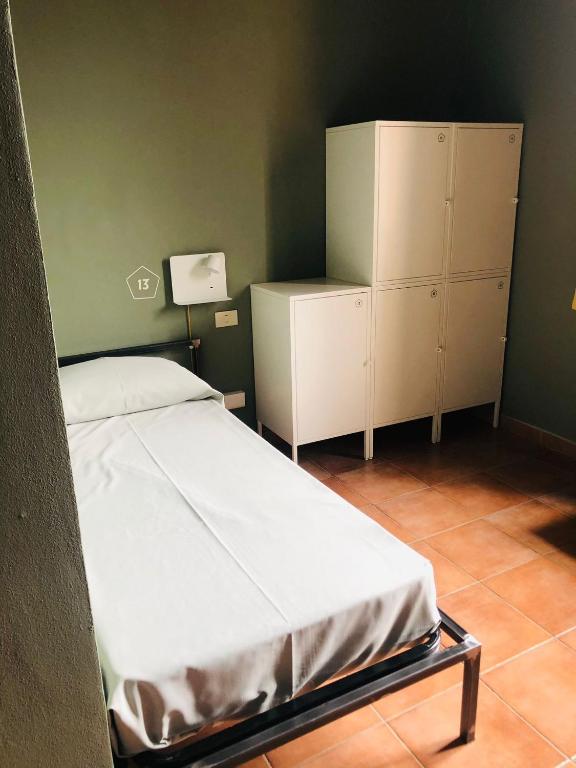 Postel nebo postele na pokoji v ubytování Casa Conte Rosso