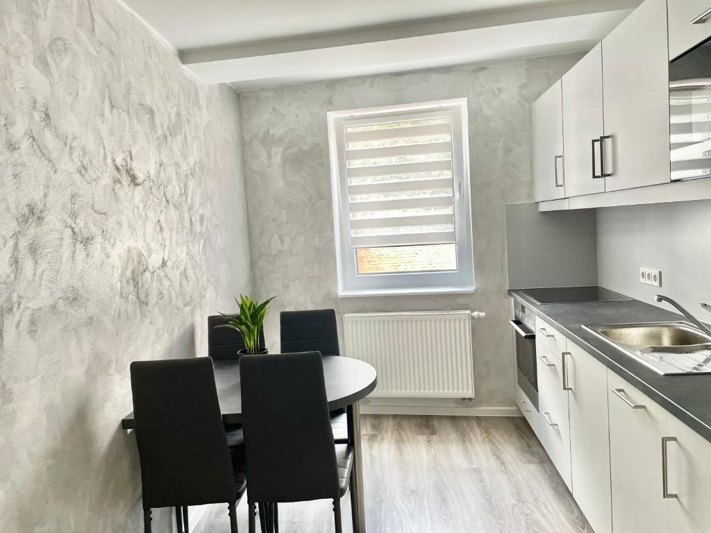 Kuchyň nebo kuchyňský kout v ubytování Ferienwohnung Appartamento Da Vinci