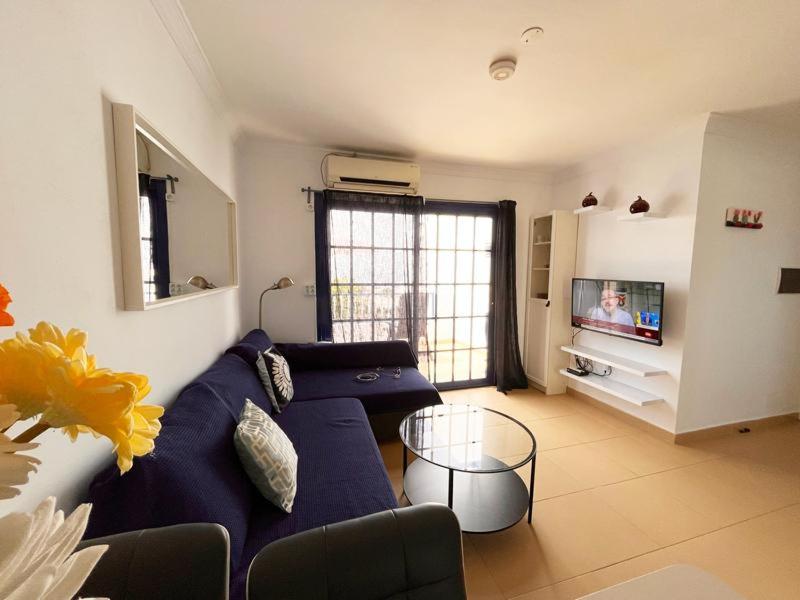 A television and/or entertainment centre at NEW Atalaya - Amazing Sea Views&Fantastic Pool
