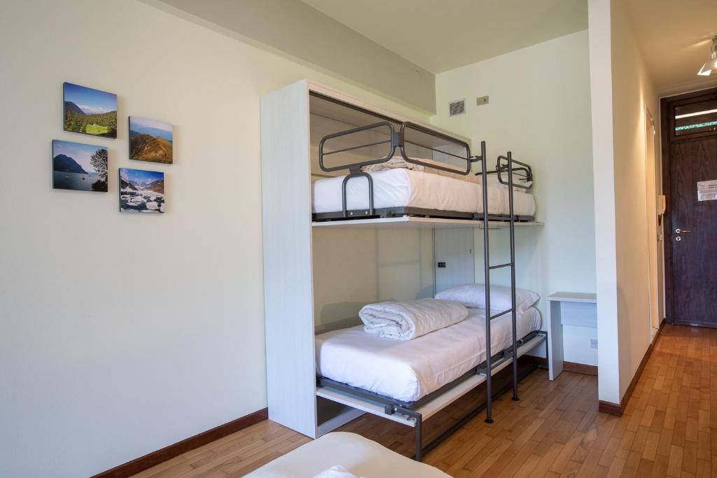 Postel nebo postele na pokoji v ubytování Grem Bike Hostel