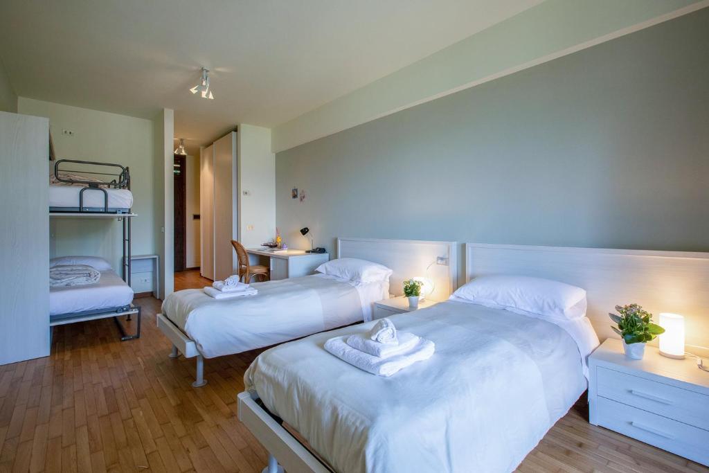Postel nebo postele na pokoji v ubytování Grem Bike Hostel
