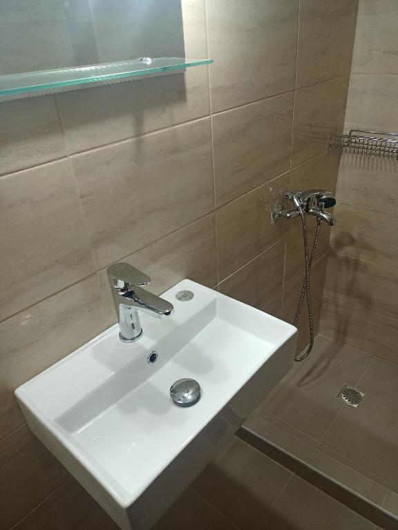 Koupelna v ubytování Elvira Hotel