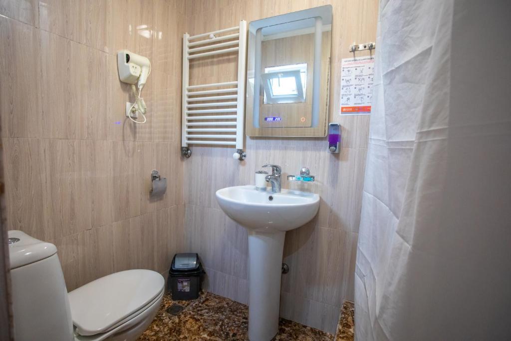 Koupelna v ubytování HOTEl MKUDRO