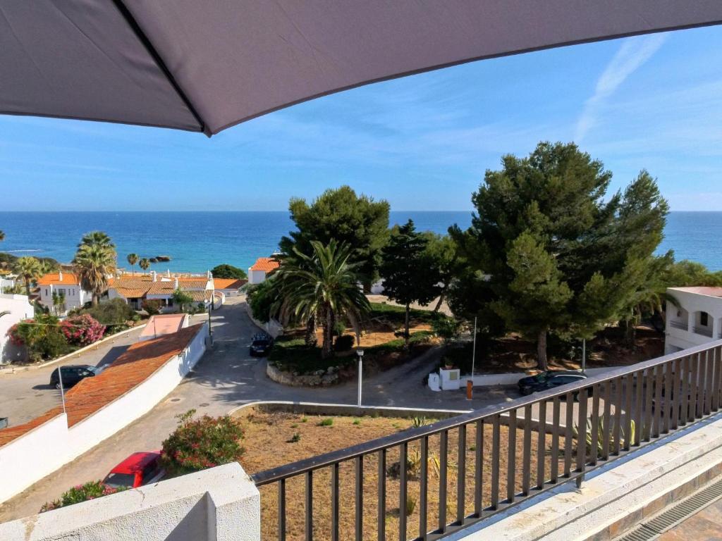 a balcony with a view of the ocean at Isabel sea view apartment in Albufeira