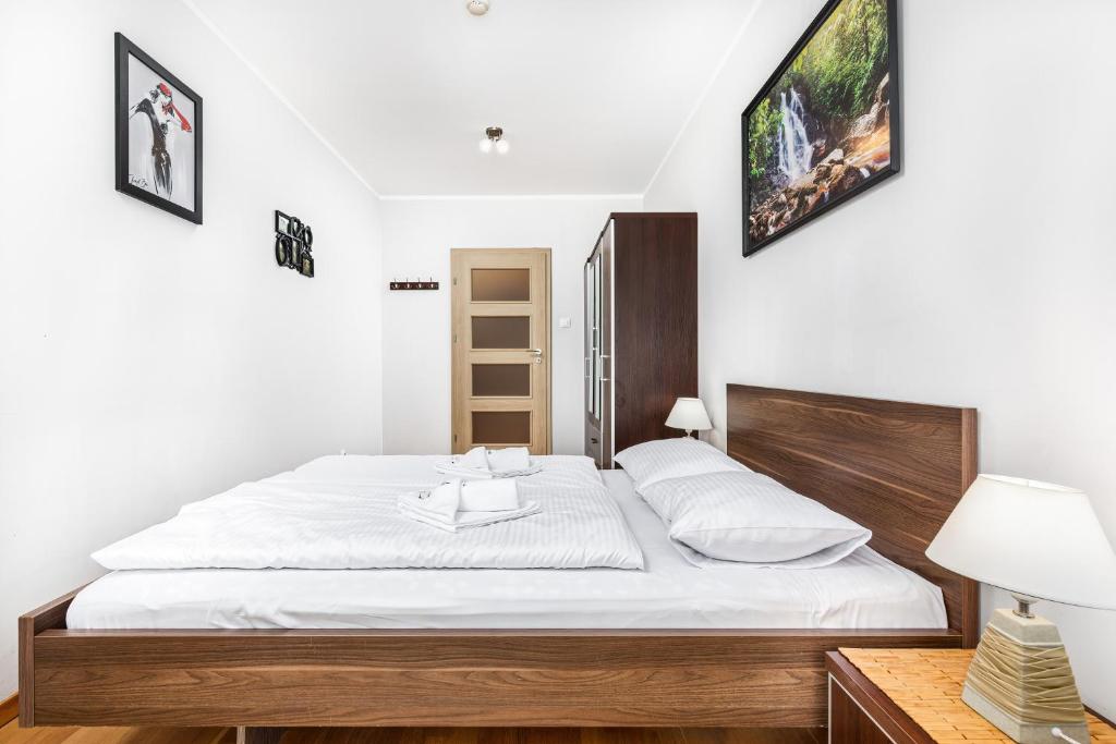 Posteľ alebo postele v izbe v ubytovaní Apartamenty Casa Marina