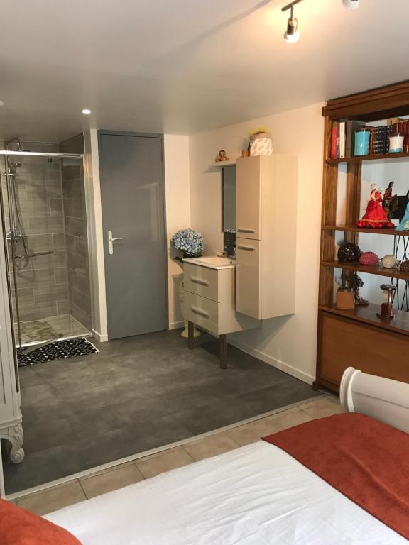 Postel nebo postele na pokoji v ubytování Petit coin de paradis