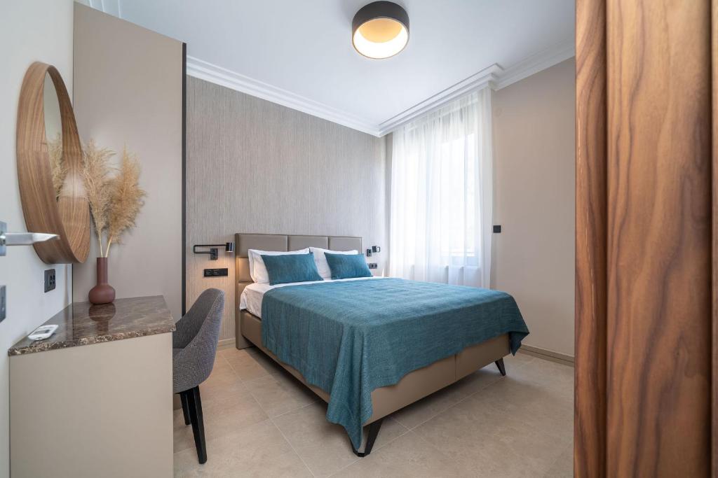 Postel nebo postele na pokoji v ubytování C Group apartments