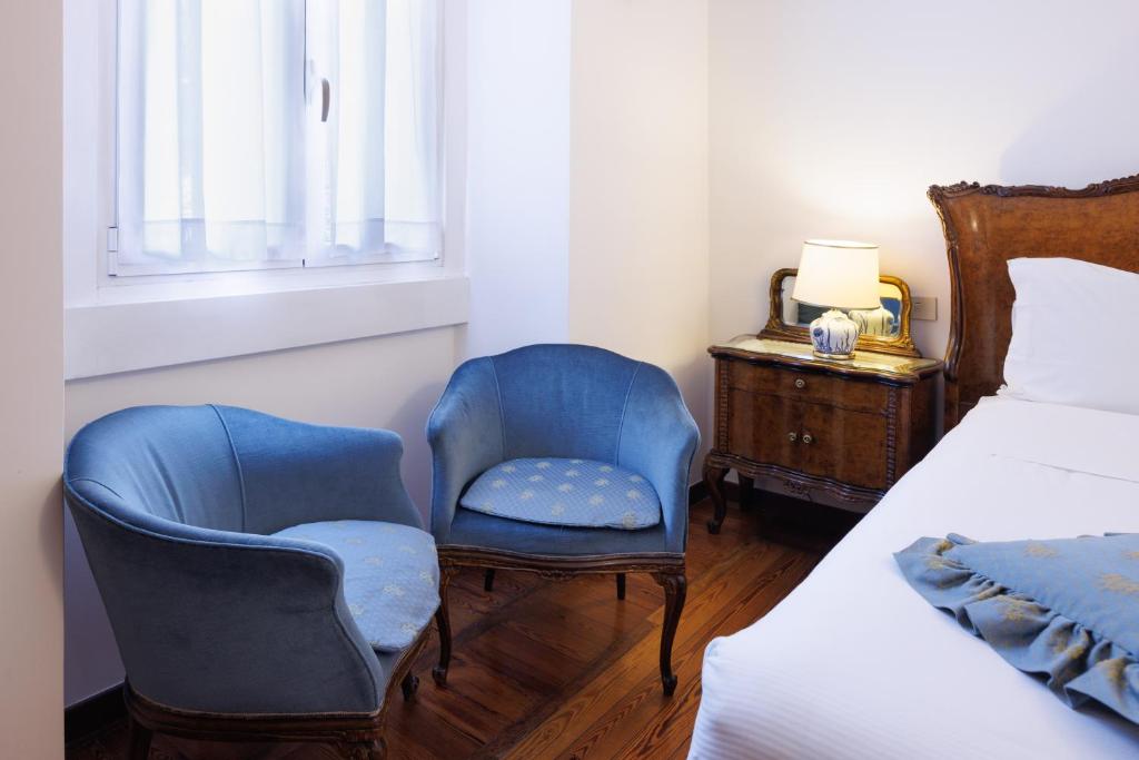 Postel nebo postele na pokoji v ubytování Antica Locanda Leonardo
