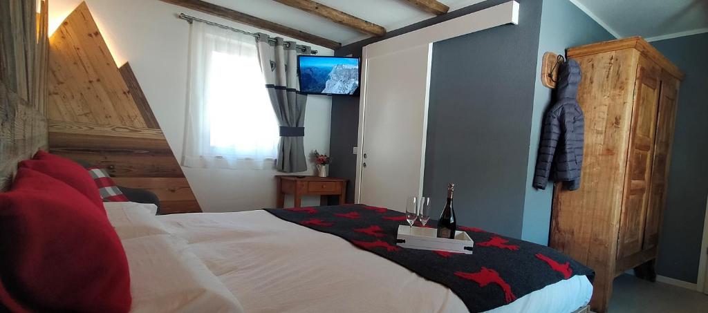 Postel nebo postele na pokoji v ubytování B&B Le Fió