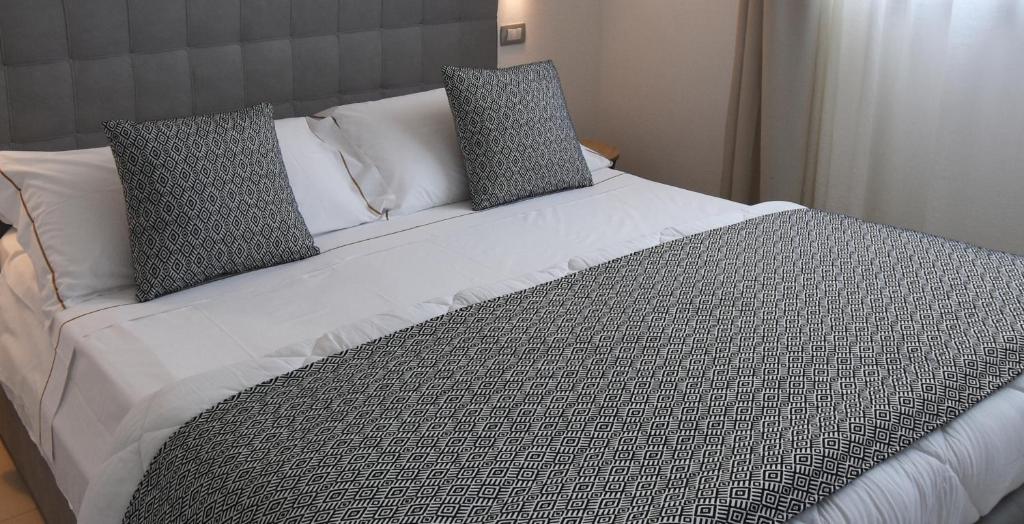 Postel nebo postele na pokoji v ubytování Xenia Hotel