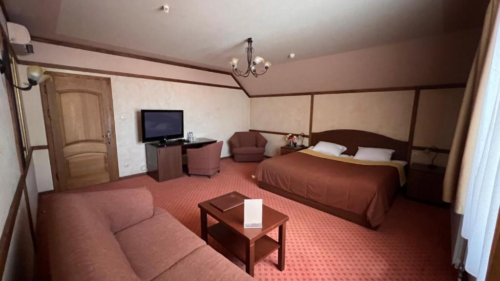 Postel nebo postele na pokoji v ubytování Hotel Complex Bahus