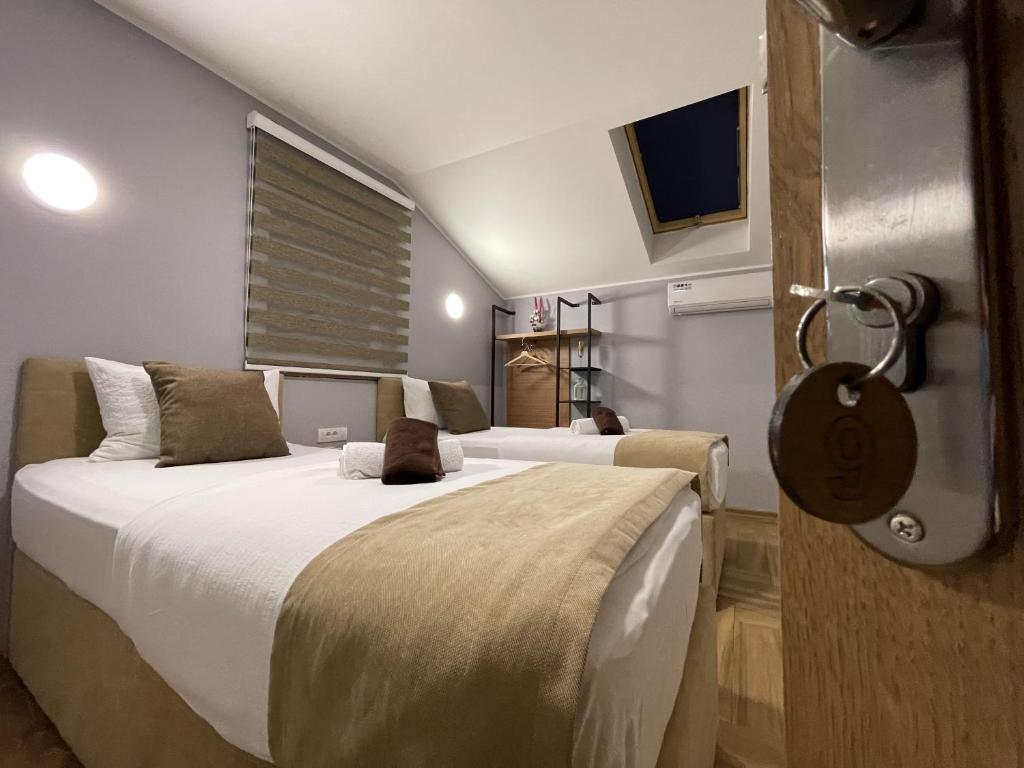 Postel nebo postele na pokoji v ubytování Garni Ideal