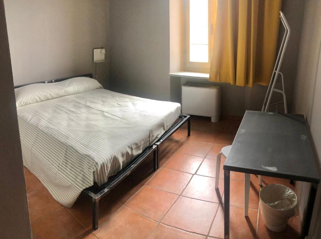 Postel nebo postele na pokoji v ubytování Casa Conte Rosso