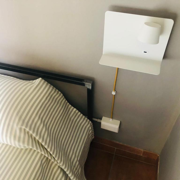 Postel nebo postele na pokoji v ubytování Casa Conte Rosso