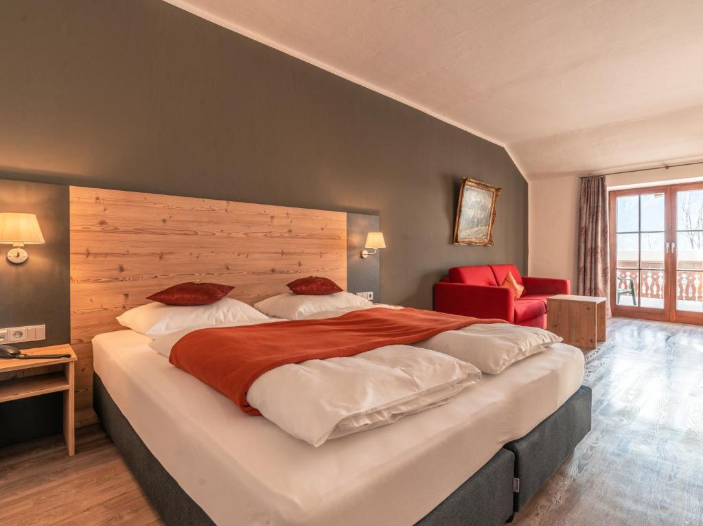 Postel nebo postele na pokoji v ubytování Hotel Heißenhof