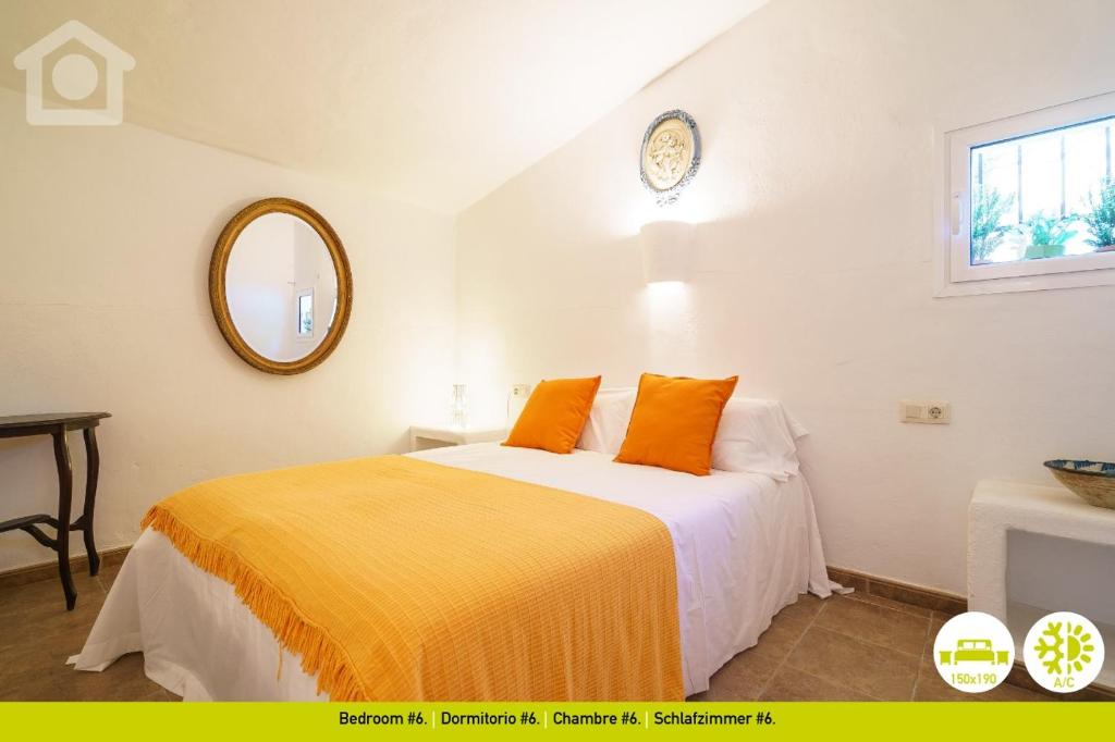 Postel nebo postele na pokoji v ubytování SolHabitat Villa La Andana