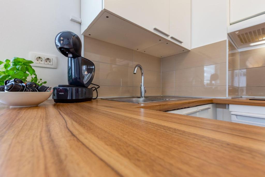 Kuchyňa alebo kuchynka v ubytovaní VK-Zadar apartman w balcony