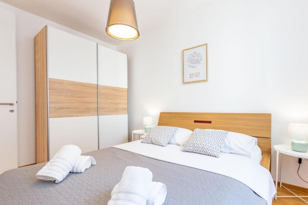 Posteľ alebo postele v izbe v ubytovaní VK-Zadar apartman w balcony