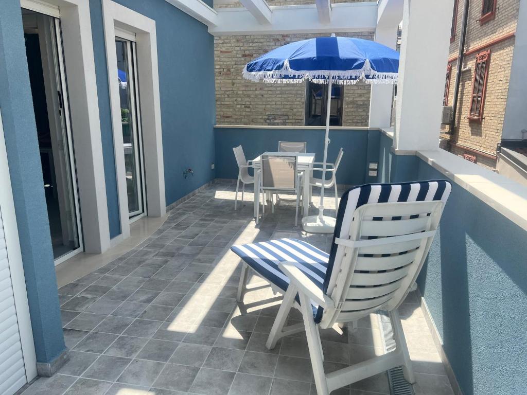 Patio alebo iná vonkajšia časť ubytovania BLU CORALLO