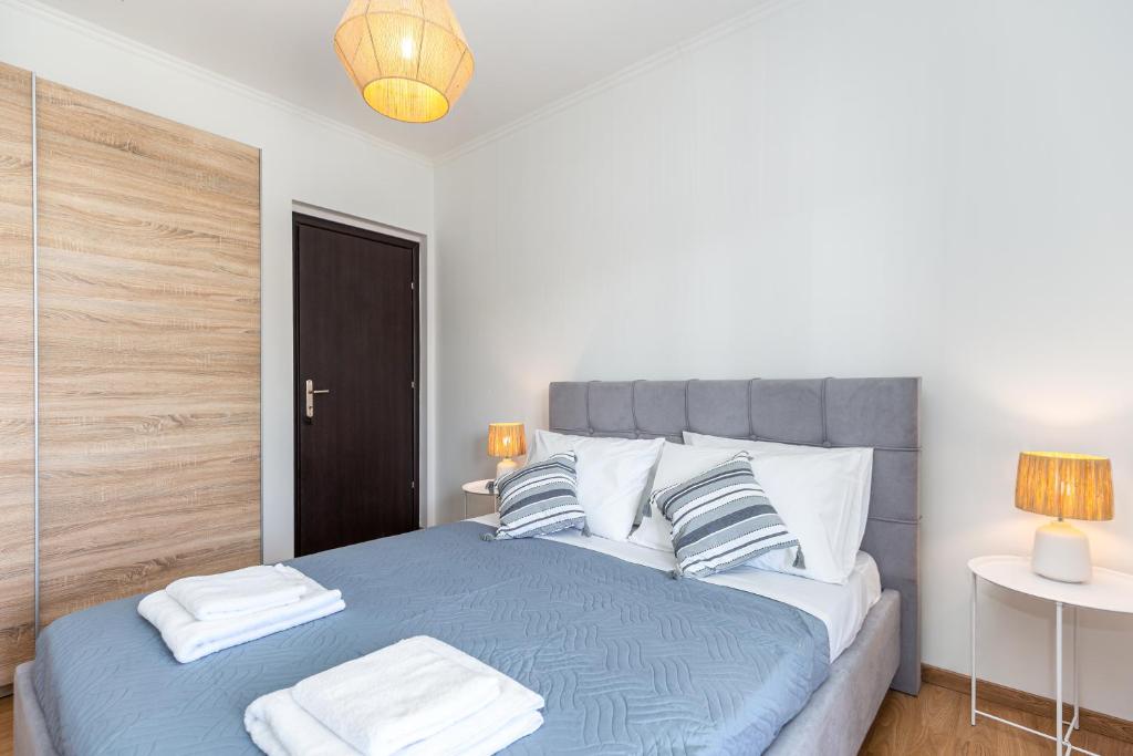 Postel nebo postele na pokoji v ubytování Casa Di Armyra - Ipsos Beach