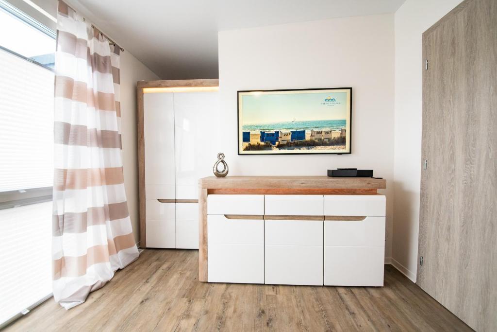 TV a/nebo společenská místnost v ubytování Baltic Village