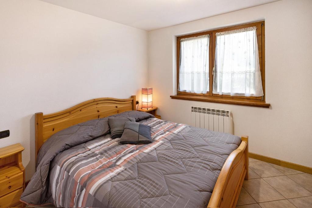 Postel nebo postele na pokoji v ubytování Baita bruno 2
