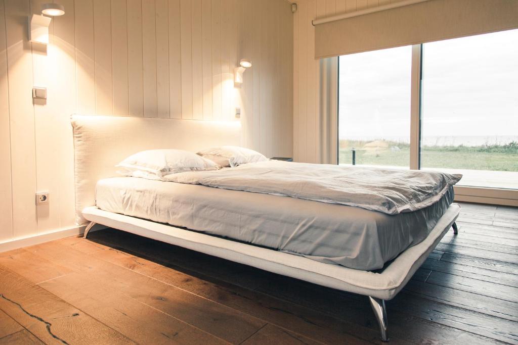 Postel nebo postele na pokoji v ubytování Privaatne rannamaja "Tuultepesa"
