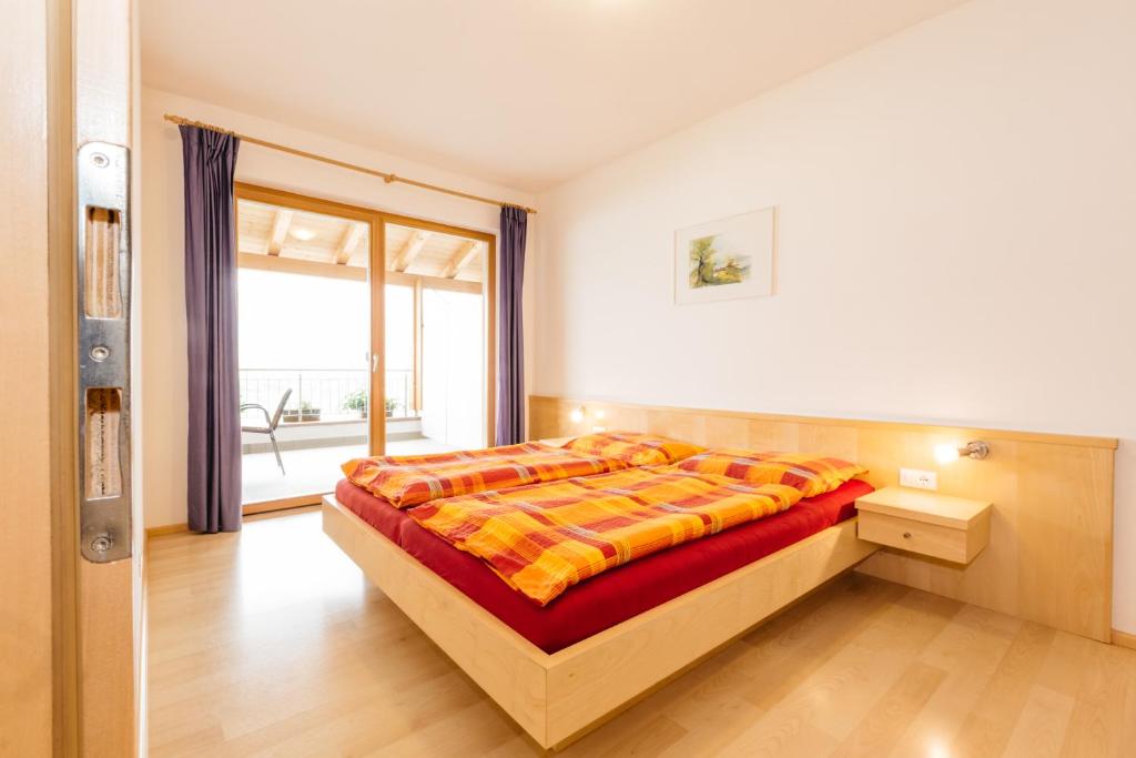 Posteľ alebo postele v izbe v ubytovaní Appartement Florian