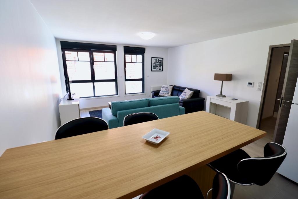 Posedenie v ubytovaní Maison bleue - Apt 4 pers, 2 chambres, prox marché