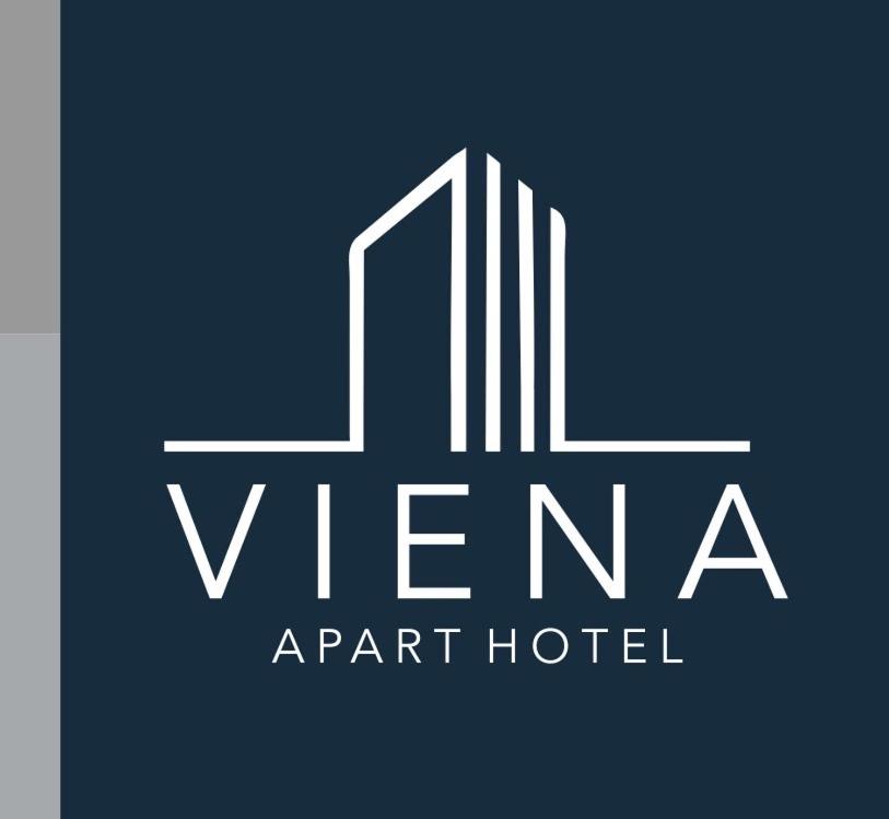 a logo for a hotel with a building at Viena Apart Hotel in Telêmaco Borba