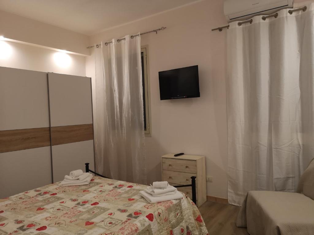 Posteľ alebo postele v izbe v ubytovaní villa xenia