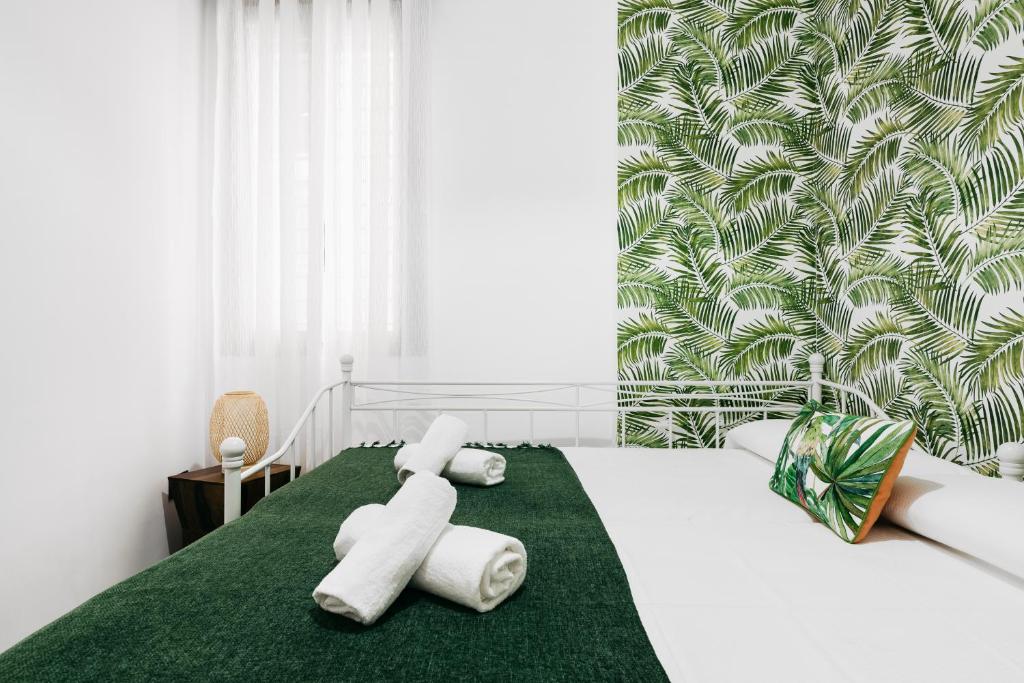 Postel nebo postele na pokoji v ubytování Apartamento Macarena junto a la Basílica de la Macarena
