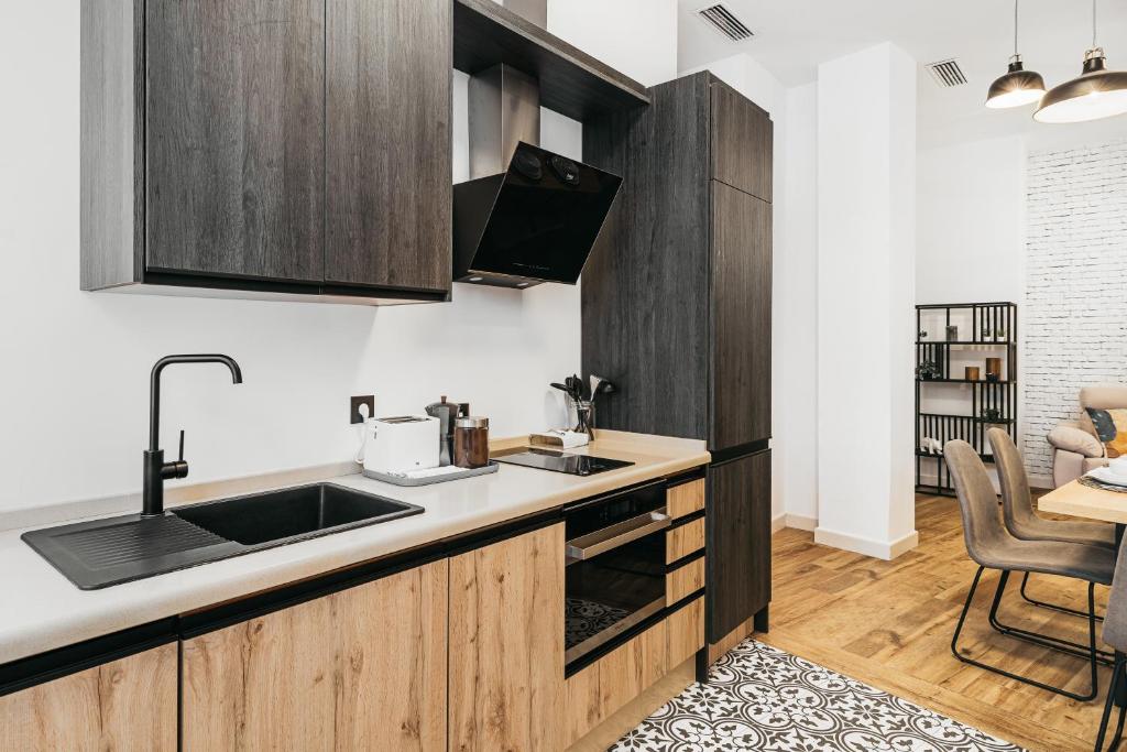 Kuchyň nebo kuchyňský kout v ubytování Apartamento Macarena junto a la Basílica de la Macarena