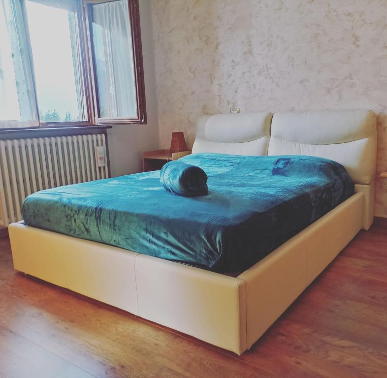 Postel nebo postele na pokoji v ubytování Barzio Paradise