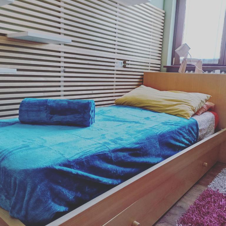 Postel nebo postele na pokoji v ubytování Barzio Paradise
