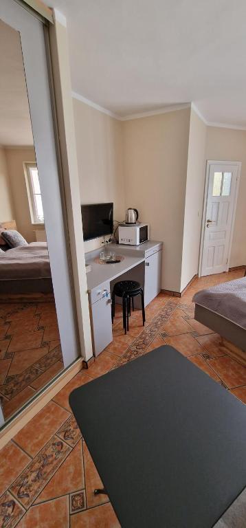 Posteľ alebo postele v izbe v ubytovaní Apartamenty Hexagon nr 15