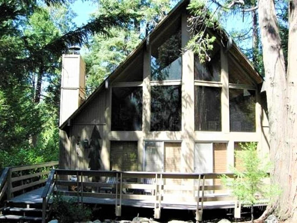 a house with a large window on the side of it at Klamath - V057 Cabin in Lake Arrowhead