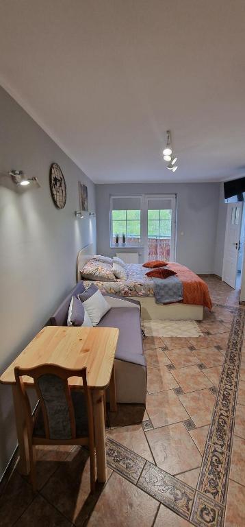 Posteľ alebo postele v izbe v ubytovaní Apartamenty Hexagon nr 25
