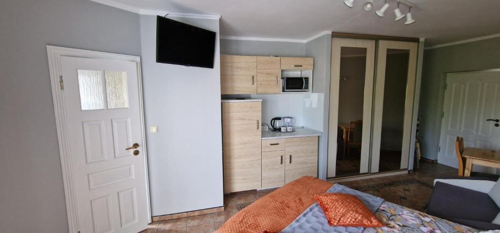 Posteľ alebo postele v izbe v ubytovaní Apartamenty Hexagon nr 25