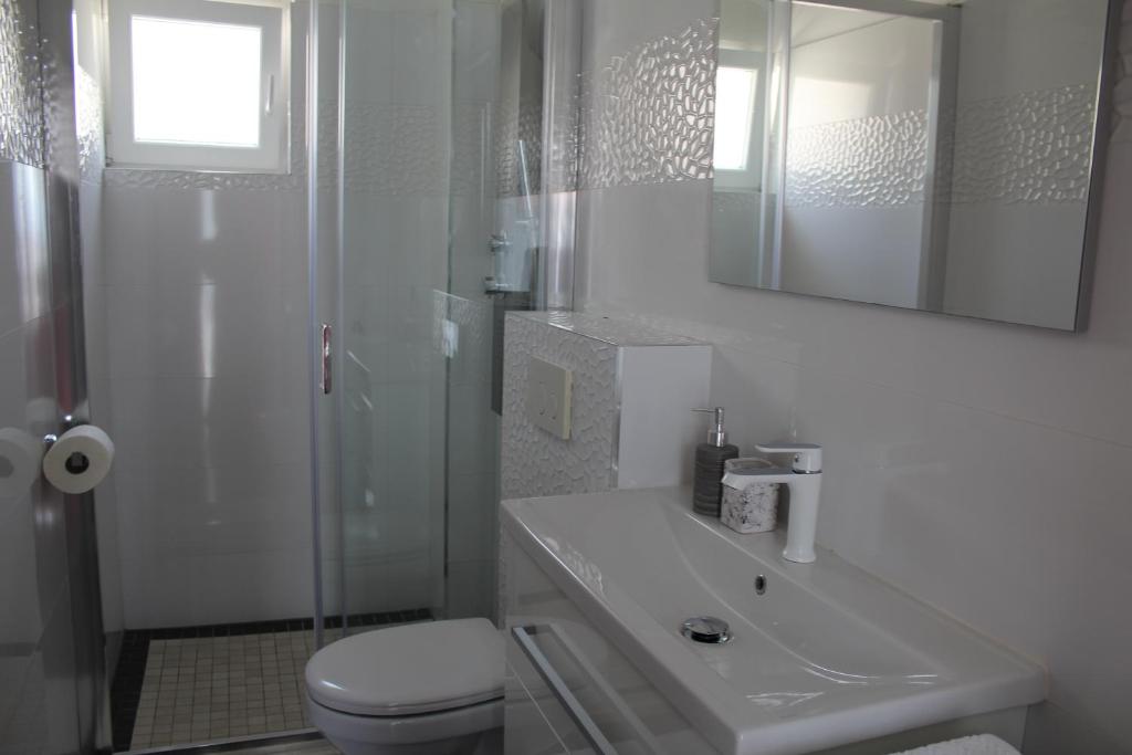 Kúpeľňa v ubytovaní Luxury apartment Maestral - private pool