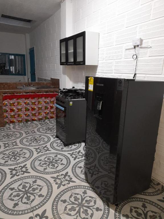 Kuchyň nebo kuchyňský kout v ubytování Apartamento Santorini Colombiano