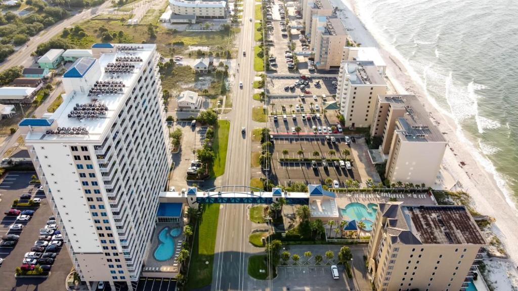 an aerial view of a city with buildings and the ocean at Crystal Tower 1906 by Vacation Homes Collection in Gulf Shores